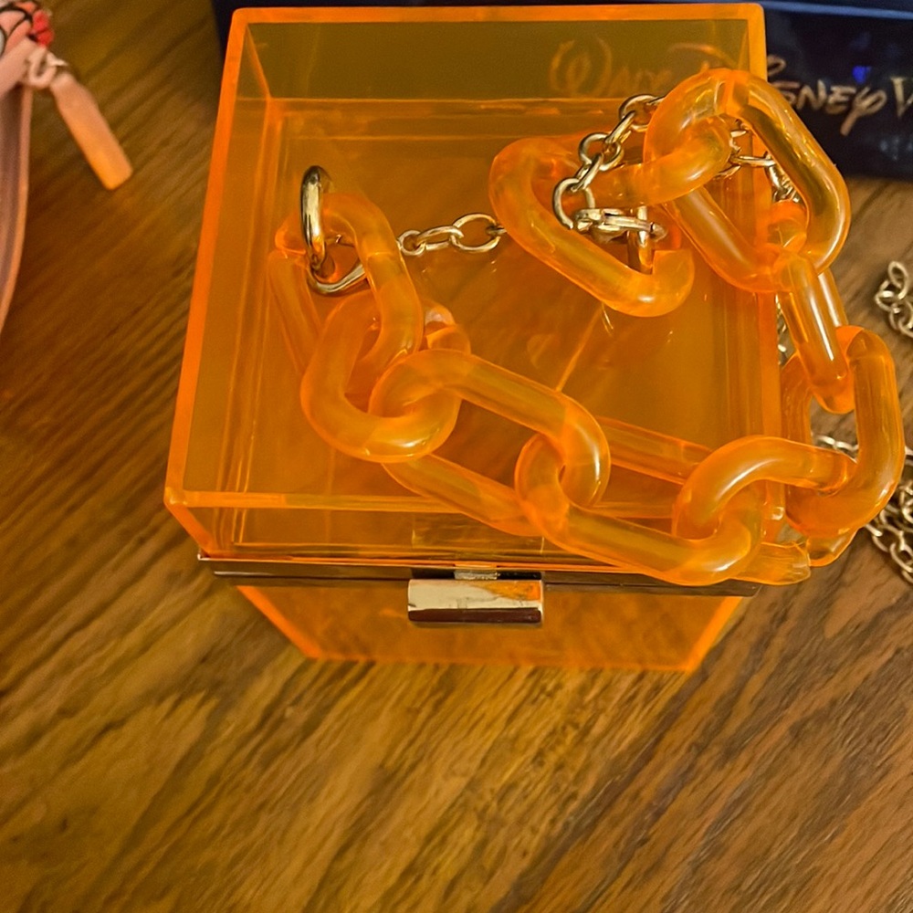 Orange purse with chain